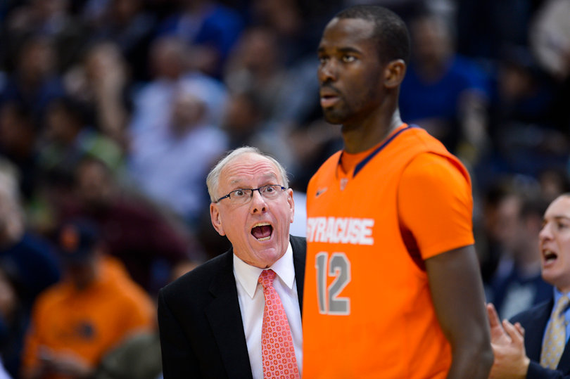 Syracuse head coach Jim Boeheim yells at center Baye Moussa Keita on the sideline.