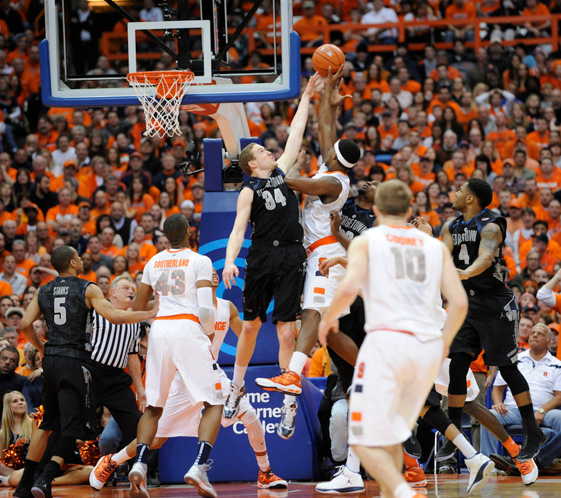 C.J. Fair is rejected by Nate Lubick in Saturday night's loss to the Hoyas.