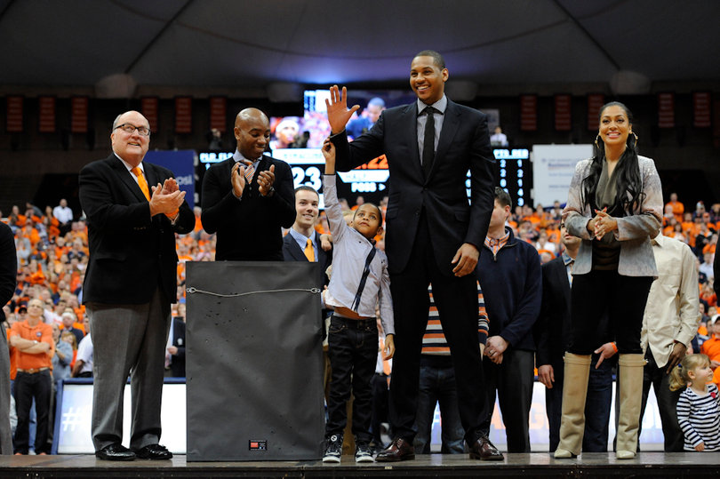 Carmelo Anthony is honored for his one-year national championship-winning SU career with a commemorative jersey. His was retired to the Carrier Dome rafters Saturday night at halftime.