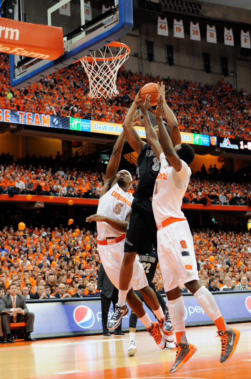 Jerami Grant and C.J. Fair defend a Georgetown drive in Saturday night's 57-46 loss in the Dome to Georgetown.
