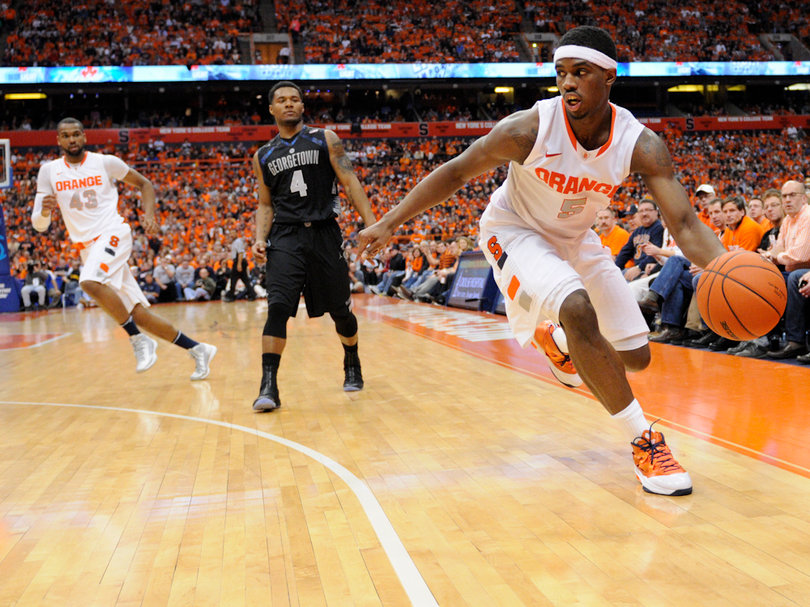 C.J. Fair controls the ball in the left-hand corner.