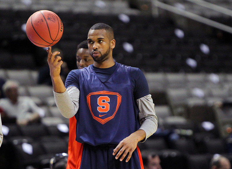 James Southerland spins a ball on his finger during practice Wednesday. Syracuse opens its NCAA Tournament play Thursday against Montana.