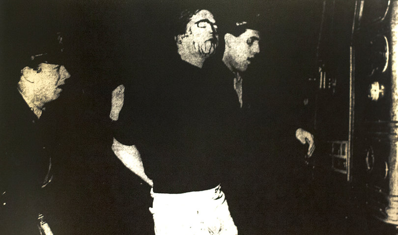 An unidentified person being arrested within 10 minutes of the Orangemen's 74-73 loss to Indiana for allegedly throwing bottle into a crowd.
