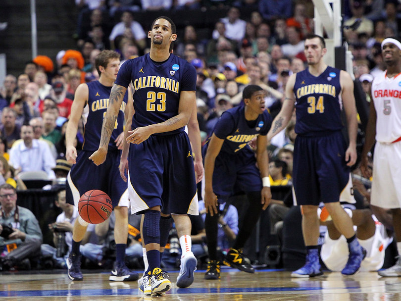 Allen Crabbe of the California Golden Bears throws the ball away as he walks on the court late in the game against Syracuse Saturday night in the NCAA Tournament's round of 32.