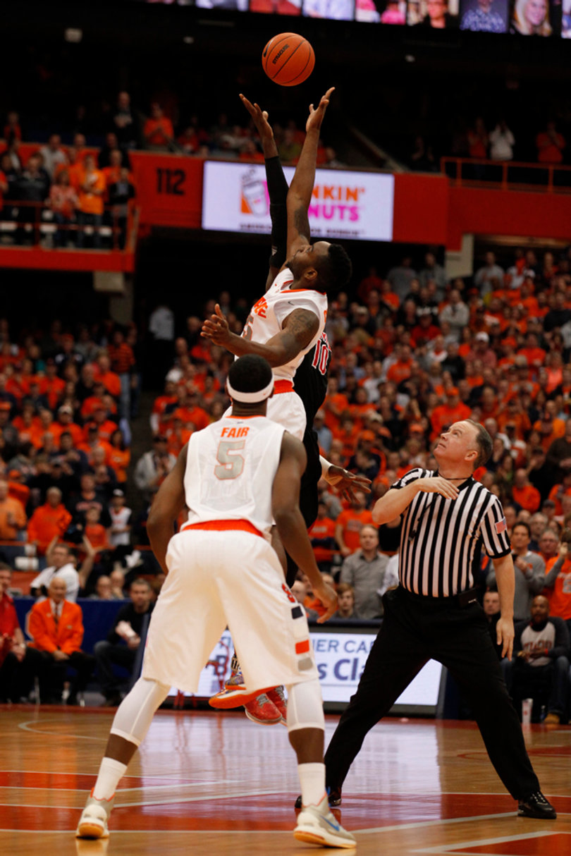 Rakeem Christmas leaps for the opening tip Saturday afternoon against No. 12 Louisville.