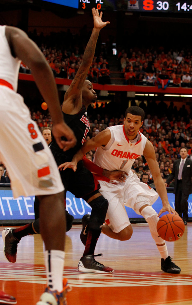 Michael Carter-Williams drives left into the paint in the Orange's 58-53 loss to No. 10 Louisville Saturday afternoon.