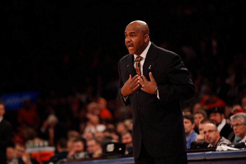 John Thompson III shouts onto the court in the first half of the Big East semifinals Friday night.