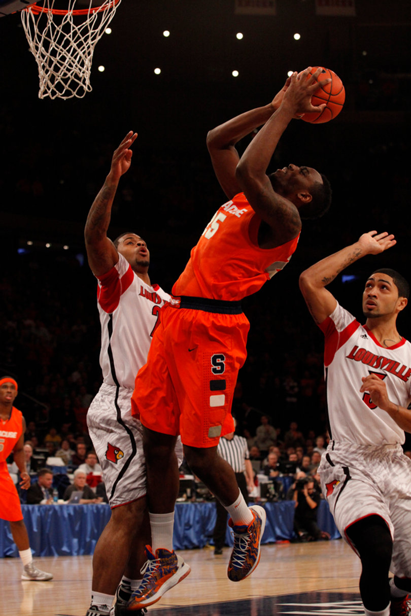 Jerami Grant contorts for a short jumper in the paint.