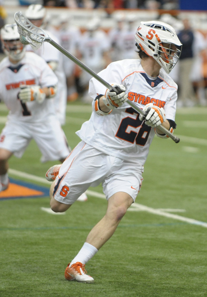 Syracuse long-stick midfielder Peter Macartney looks to pass in Syracuse's 9-8 win over Virginia.