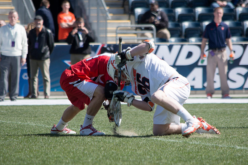Brendan Conroy fights for a faceoff.