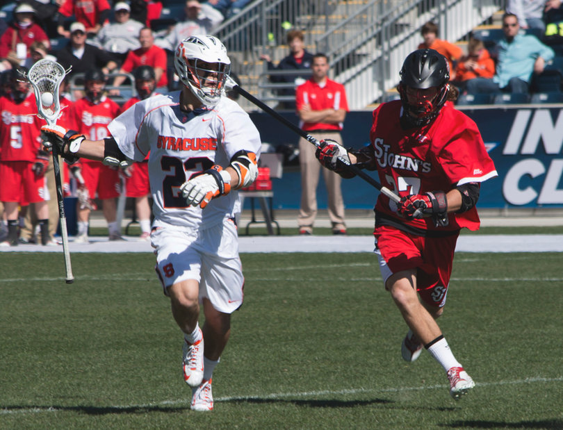 JoJo Marasco runs past St. John's defender John Bello.