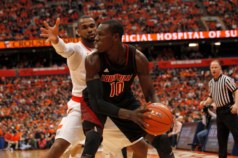 James Southerland defends against Louisville's Gorgui Dieng. Southerland had 13 points, seven rebounds and an assist. He shot 5-of-12 from the field and 3-of-5 from 3 range. Dieng had a double-double with 11 points and 14 boards.