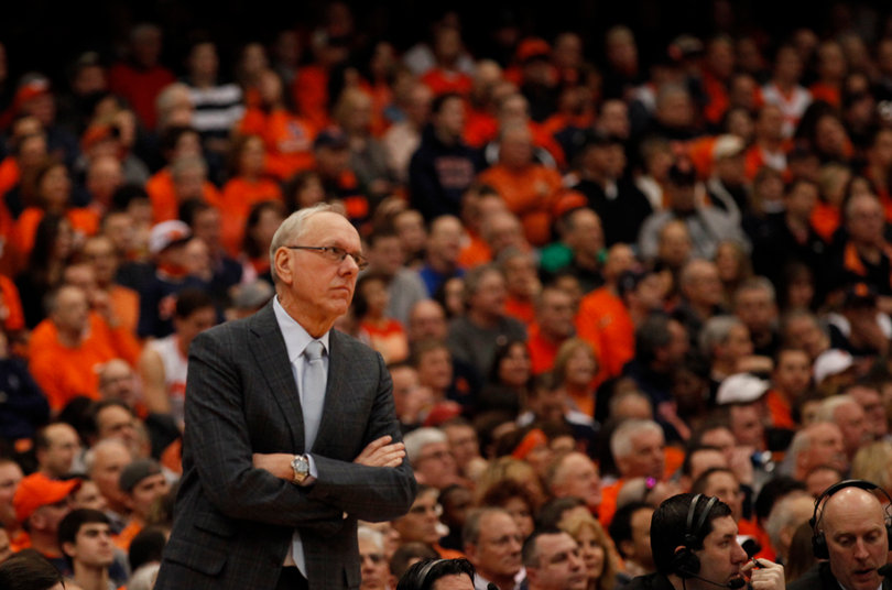 Jim Boeheim stares out onto the court bearing his name in the first half.