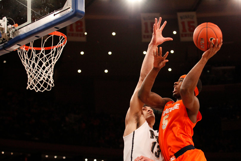 C.J. Fair goes for a shot, but is blocked by Steven Adams (#13).