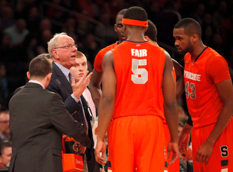 Head coach Jim Boeheim talks to his team during a timeout during overtime.