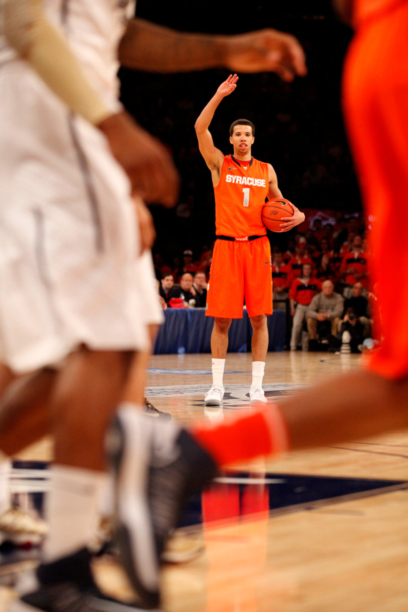 Michael Carter-Williams looks for an open teammate.