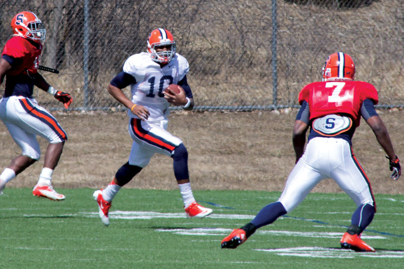 Syracuse quarterback Terrel Hunt excels as a runner, but is working to improve on his passing this spring.