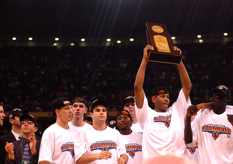 Carmelo Anthony lifts the national championship trophy in 2003 in the Louisiana Superdome in New Orleans.