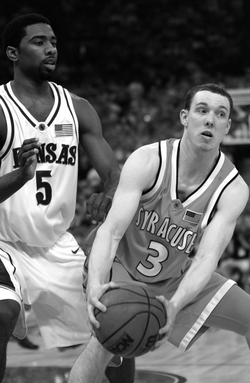 Guard Gerry McNamara and Syracuse went from unranked in the preseason to national champions.