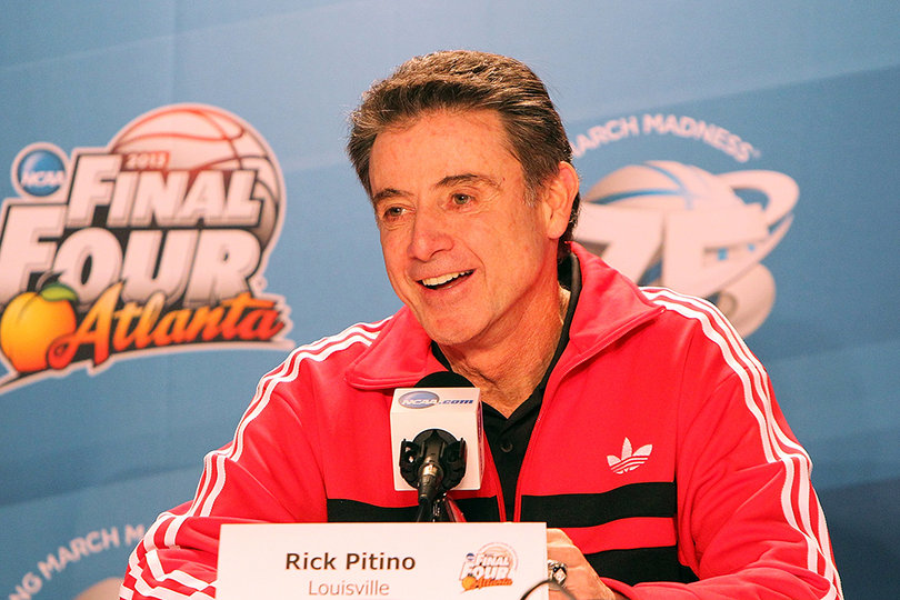 Louisville head coach Rick Pitino smiles as he speaks during the Final Four press conferences of the 2013 NCAA Men's Basketball Tournament in the Georgia Dome.