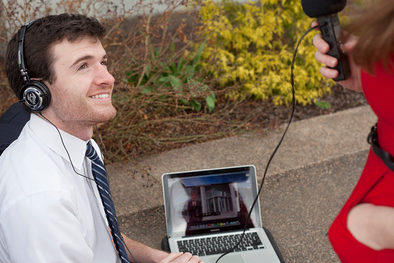 Alex kuzoian, one of the founders of The Kumquat, records an upcoming video about laxataves in SU dining hall food with another student. The satirical news group makes fun of campus stereotypes such as Greek life, Newhouse students and Student Assocation.