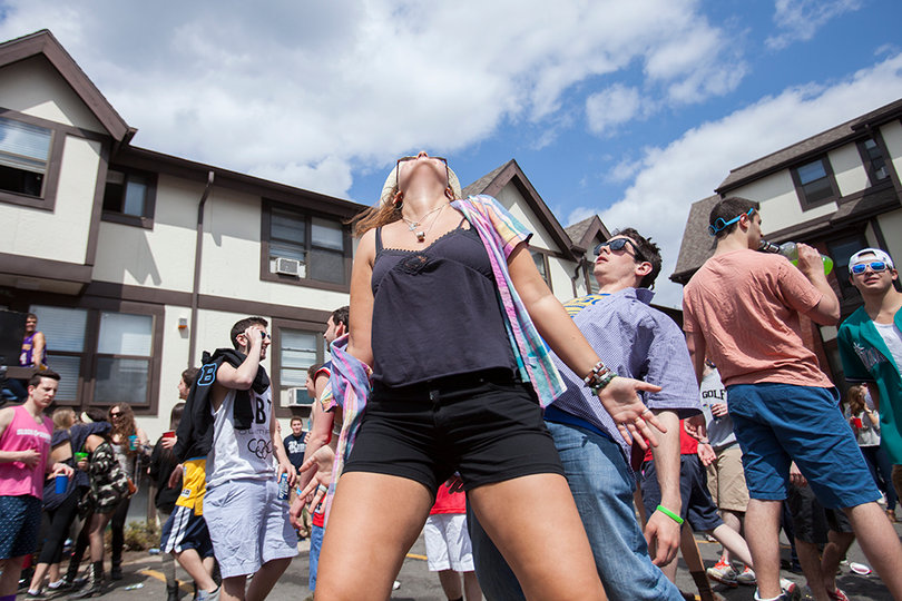 Natalie Garland (left) and Danny Donateli (right), sophomores, dance outside of Castle's Court, Friday afternoon.