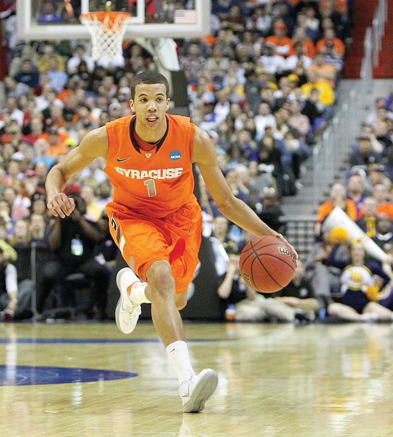 Michael Carter-Williams reaffirmed himself as an NBA lottery pick orchestrating the Orange offense with slashing drives, kicks, dumps and even some knockdown 3s in Syracuse's run to the Final Four.