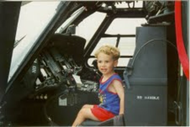 Derek Maltz, 3, sits in the cockpit of an Air Force helicopter at Patrick Air Force Base. Michael Maltz showed him and his family around the base before military police mistakenly surrounded them.