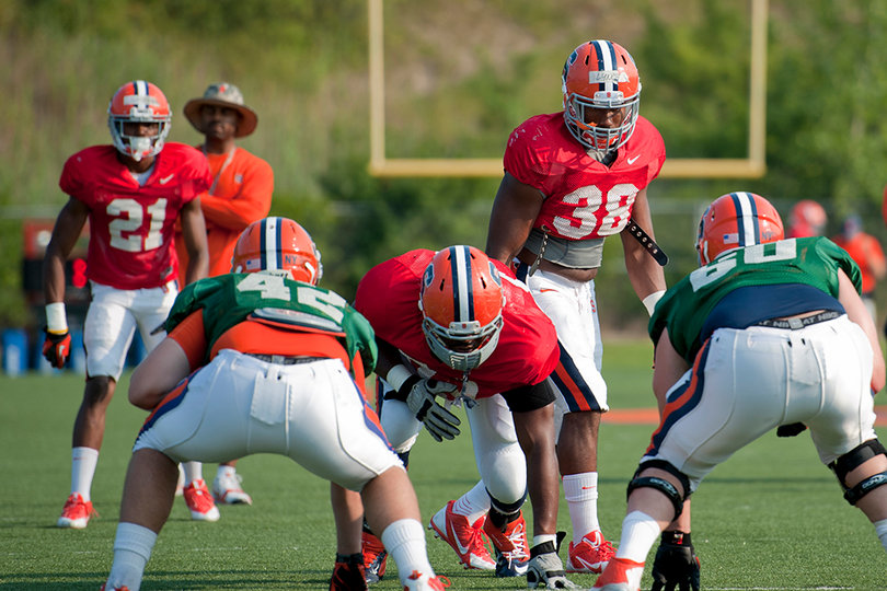Junior linebacker Cam Lynch looks on before a snap during Syracuse training camp.