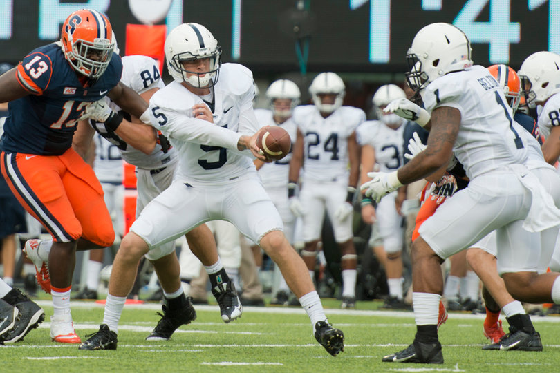 Tyler Ferguson threw one pass for Penn State when Hackenberg was briefly sidelined. Here, Ferguson hands the ball off to Belton. 