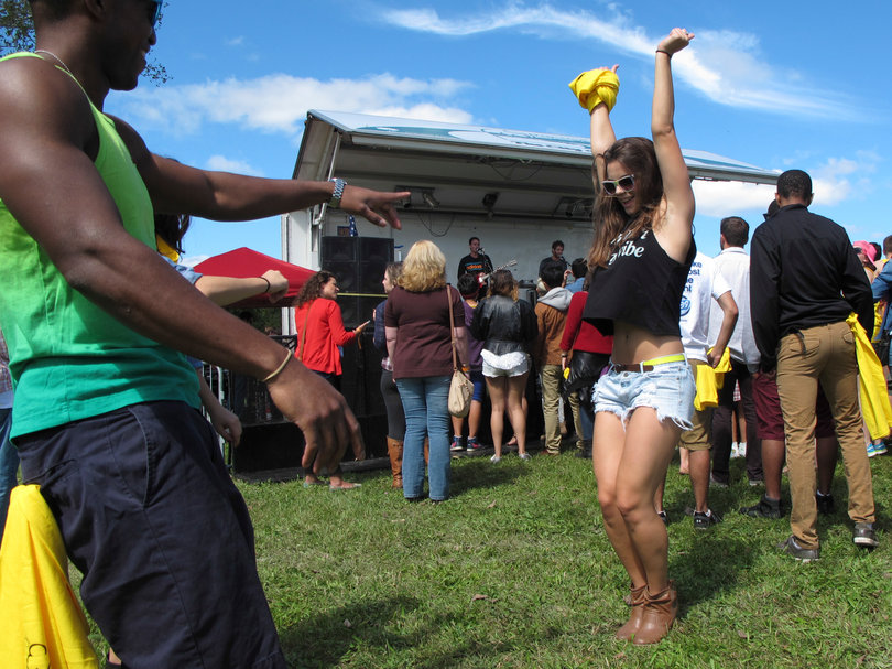 Shelagh Ramsden, a senior in the David B. Falk College of Sport and Human Dynamics, dances during Smallpool's set.