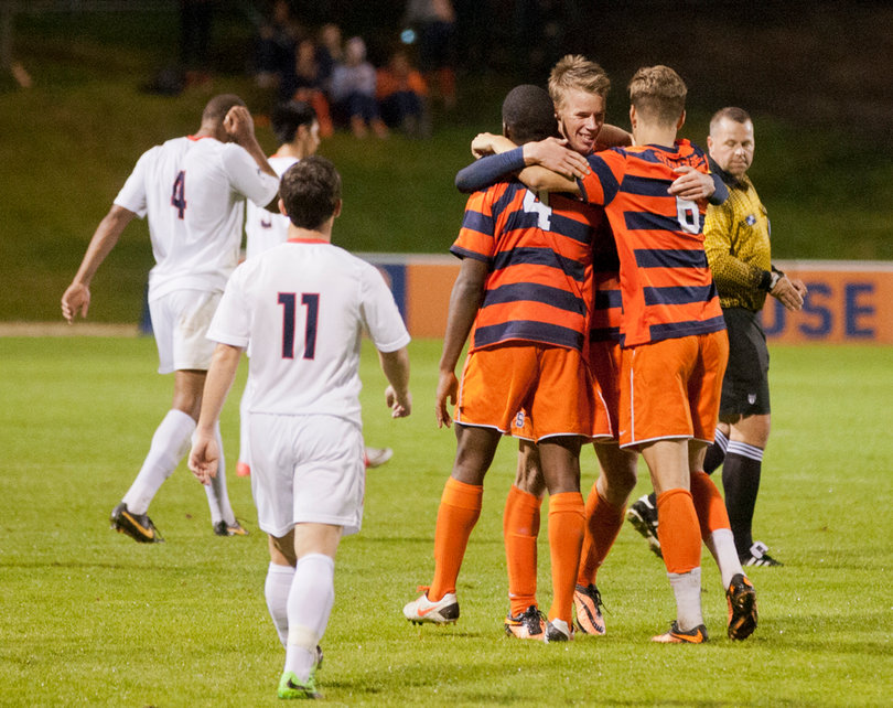 Syracuse celebrates after knocking off the No. 13 team in the nation.