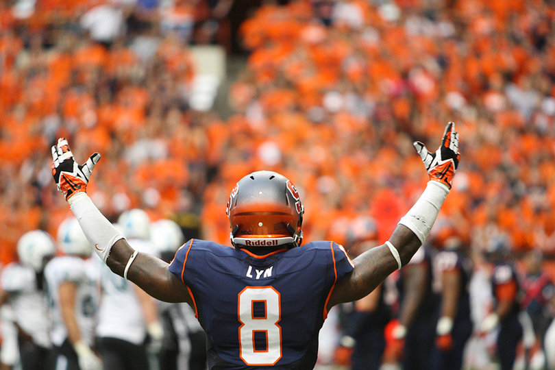 Sept. 21, 2013: Keon Lyn, a Syracuse cornerback, raises his hands to pump up the Carrier Dome crowd. The Orange beat Tulane 52-17 on Saturday for the 700th win in program history. SU has won back-to-back games and totaled 106 points while allowing just 17 after throttling Wagner last week. Terrel Hunt made his first start at quarterback against the Green Wave and has been almost perfect since taking over for Drew Allen against the Seahawks. Syracuse enters a bye week before hosting No. 3 Clemson, who comes to the Dome on Oct. 5 for SU's ACC debut. 