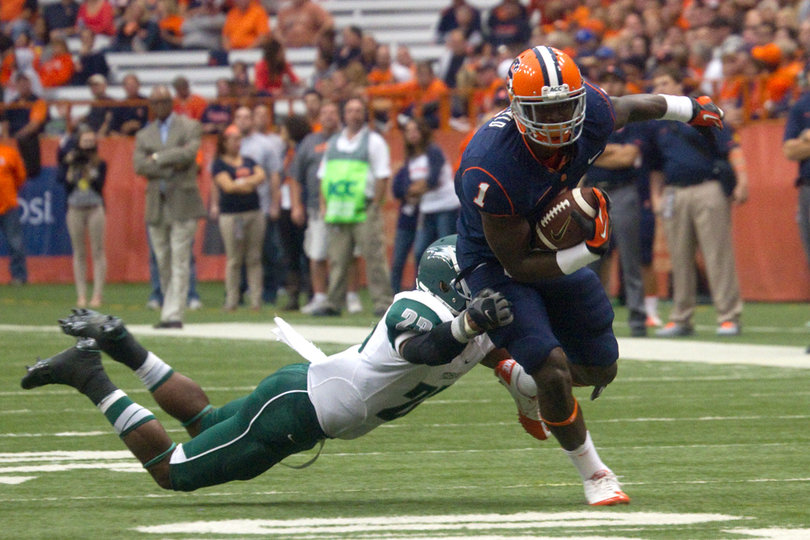 Ashton Broyld tries to break a tackle and motor forward for a first down. 