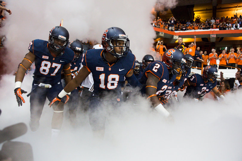 Oct. 5, 2013: The Syracuse University football team emerges onto the field  before the start of the Syracuse-Clemson matchup. Clemson beat Syracuse 49-14 inside the Carrier Dome. 