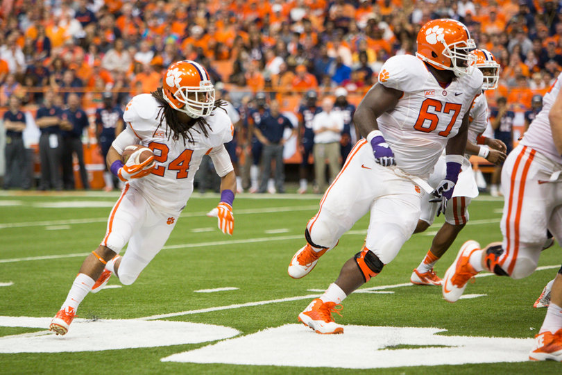 Clemson running back Zach Brooks rounds the corner on a rushing attempt.