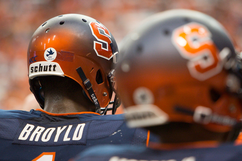 A Remembrance Week sticker is seen on the back of Orange H-back Ashton Broyld's helmet.