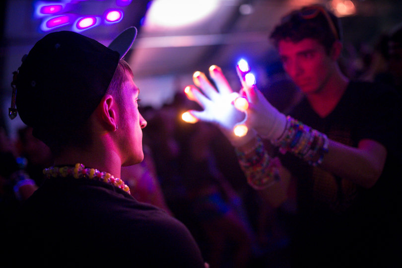 Mitchell Petrotta watches as Brandon Stites shows off his gloving skills.