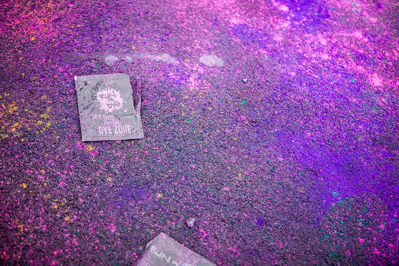During the race, volunteers threw powder dye at runners as they passed through designated checkpoints. Afterward, runners threw their own dye into the sky.