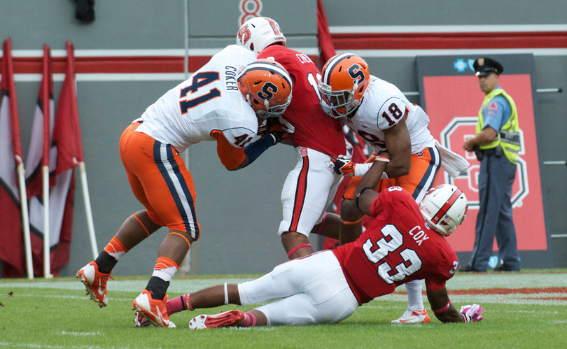 Darius Kelly and Lewellyn Coker team up for a tackle 