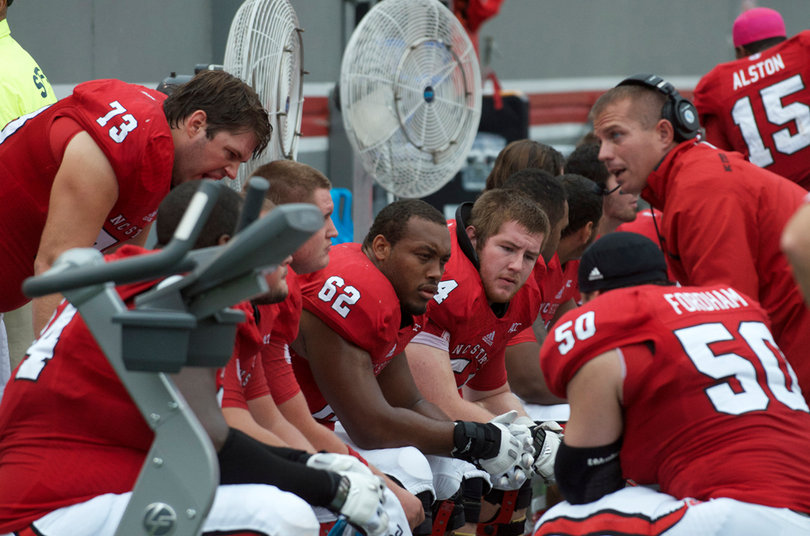 NC State players discuss strategy.