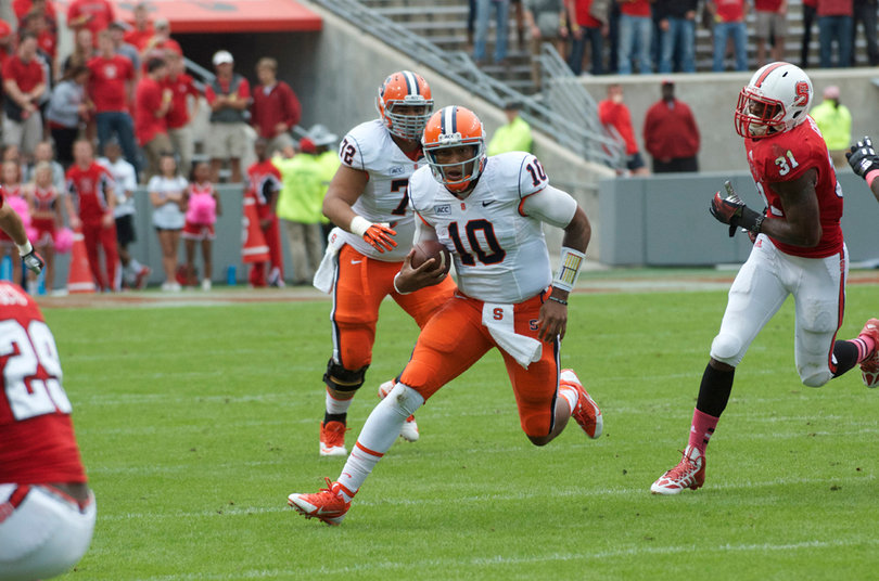 Syracuse quarterback Terrel Hunt breaks free for a gain. 
