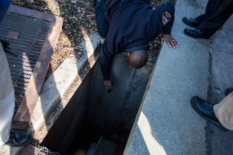 Oct. 8, 2013: A Syracuse Fire Department investigator responds to a call about a fire in an air ventilator outside of Huntington Beard Crouse Hall. People in the building were evacuated. There were no injuries. 