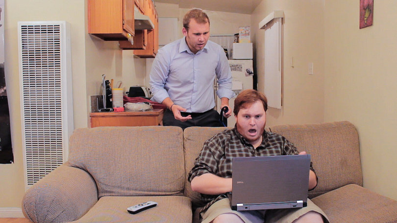 (From left) Chris McCreary and Danny Skinner perform in the sketch "Pizza Tracker," during which Skinner follows the preparation and route of his pizza. 