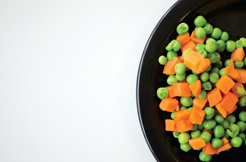 Cooked peas and carrots