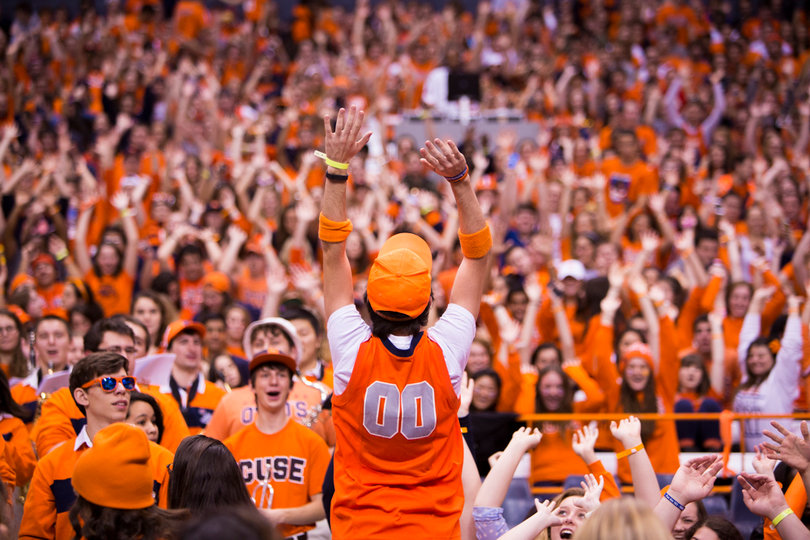 Brad Slavin leads the Syracuse student section in a cheer during the first game of the Orange's season.