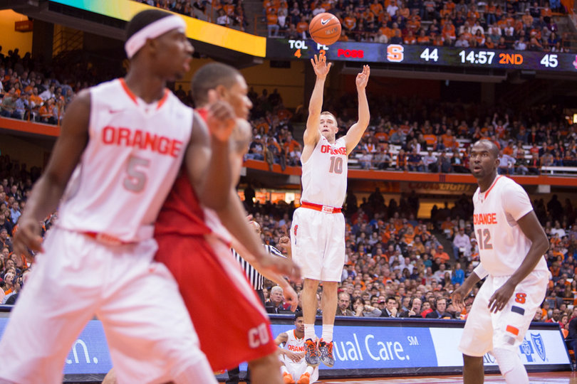 Trevor Cooney sinks one of his seven 3-point buckets to put Syracuse ahead of Cornell. 

