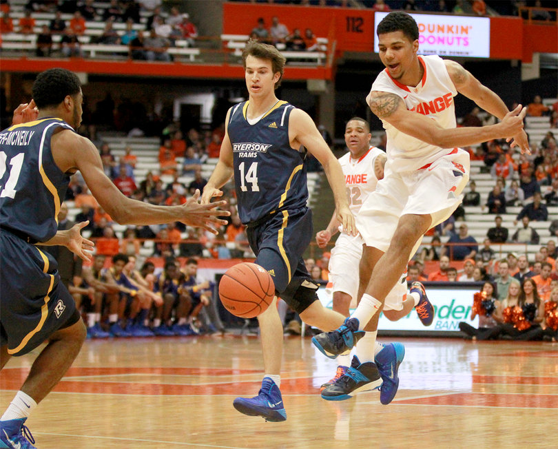 Michael Gbinije committed three more turnovers in Syracuse's preseason finale against Ryerson University. The forward is the Orange's backup point guard behind freshman Tyler Ennis.