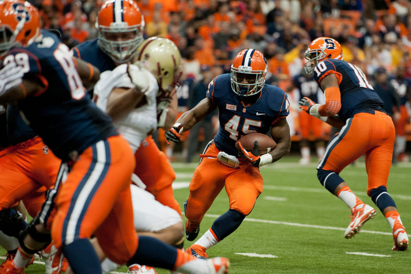 Jerome Smith cuts outside after receiving a misdirection handoff from Hunt. Smith ran for 46 yards on 18 carries. 