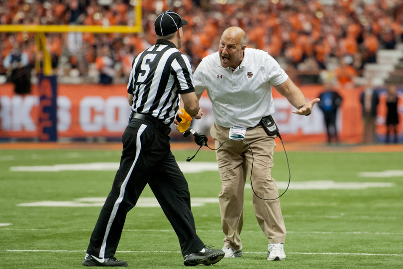 Addazio follows a referee onto the field to argue a call. 